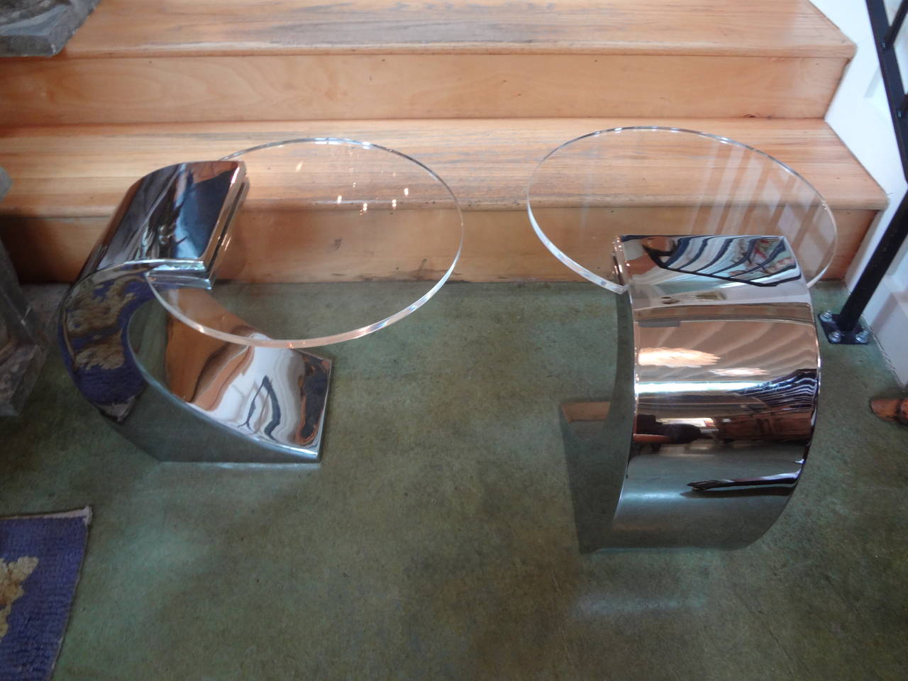 Chic pair of Mid-Century Modern chrome cigarette or side tables with acrylic tops.

Please click KIRBY ANTIQUES logo below to view additional pieces from our vast inventory.