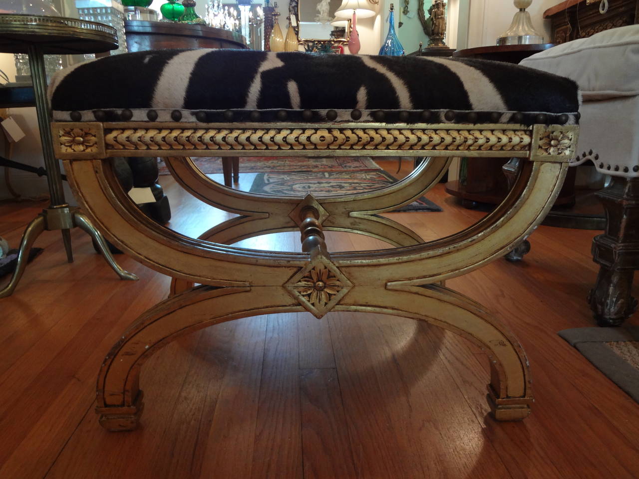 Simple and elegant French Louis XVI style giltwood bench/tabouret newly upholstered in zebra hide with brass nailhead trim.

Please click KIRBY ANTIQUES logo below to view additional pieces from our vast inventory.

 