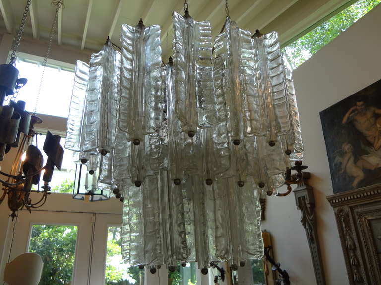 Venini Style Murano glass chandelier with unusually shaped blocks, newly wired for U.S. market.

Please click KIRBY ANTIQUES logo below to view additional pieces from our vast inventory.
     