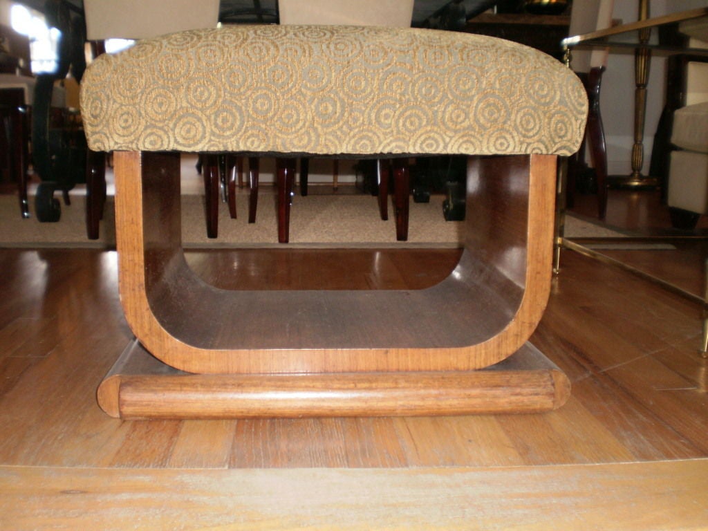 Handsome French Art Deco U-shaped walnut bench/ottoman/stool/tabouret newly upholstered in Art Deco style fabric.

 

