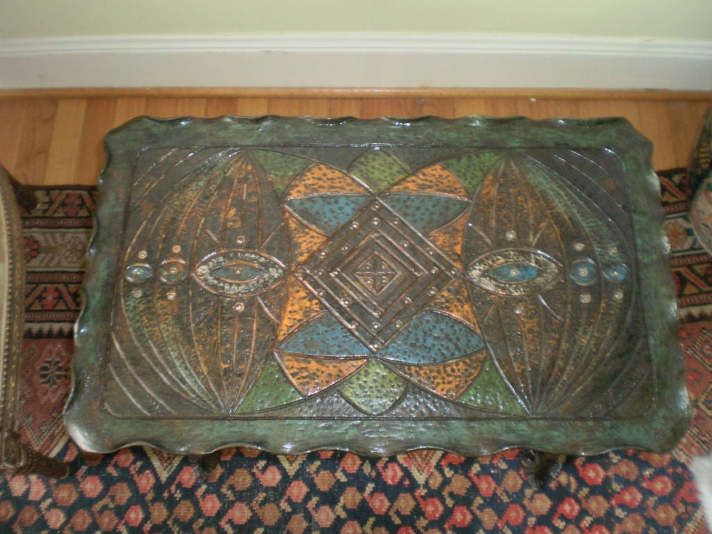 Addison Mizner Inspired Arts & Crafts wrought iron tray-top table.
Interesting hand forged wrought iron table with patinated geometric designed tray top in the manner of Addison Mizner.
This versatile table would work well in an Art Deco,