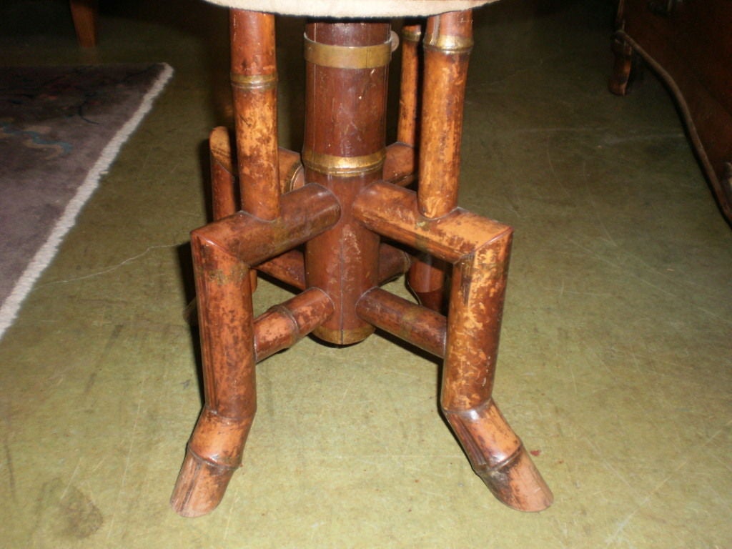 Antique French bamboo swivel stool.
Handsome 19th century French Napoleon III upholstered bamboo stool, vanity stool, tabouret, harp or piano swivel stool.
The swivel mechanism could be disabled if desired.

