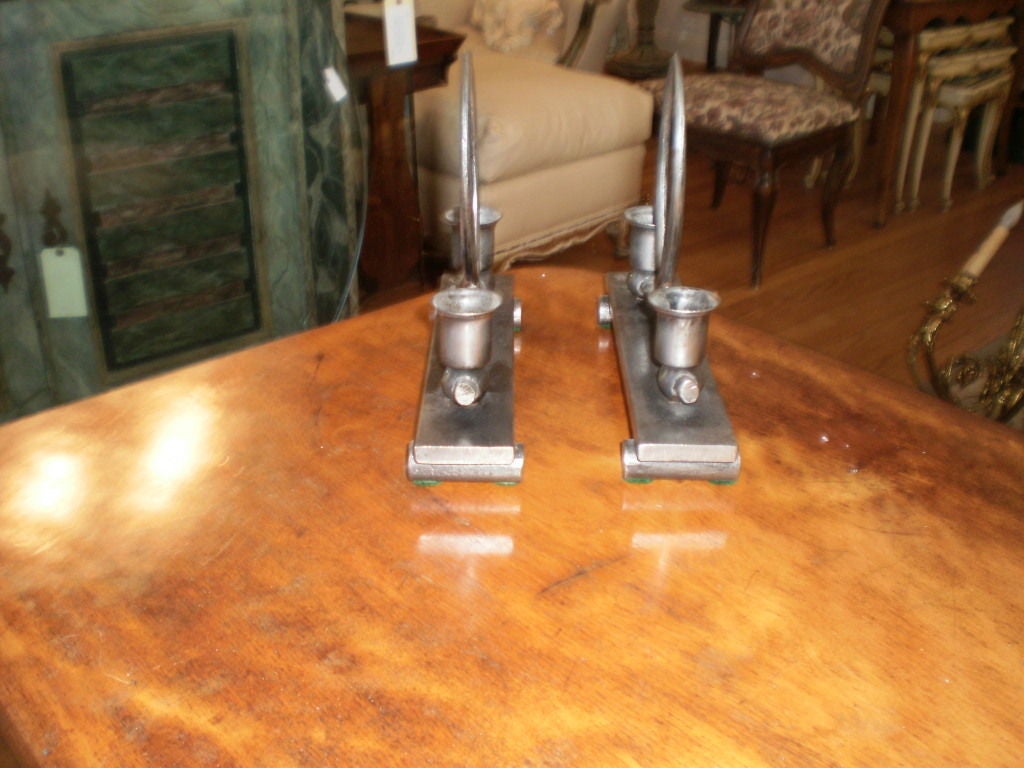 Stylish pair of period French Art Deco geometric steel candle holders or candlesticks, stamped Charles Piguet, Circa. 1930

