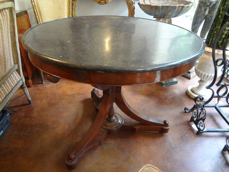 Great lines is the best description for this great French walnut Louis Philippe game table or gueridon with original marble top from the 19th century.

    