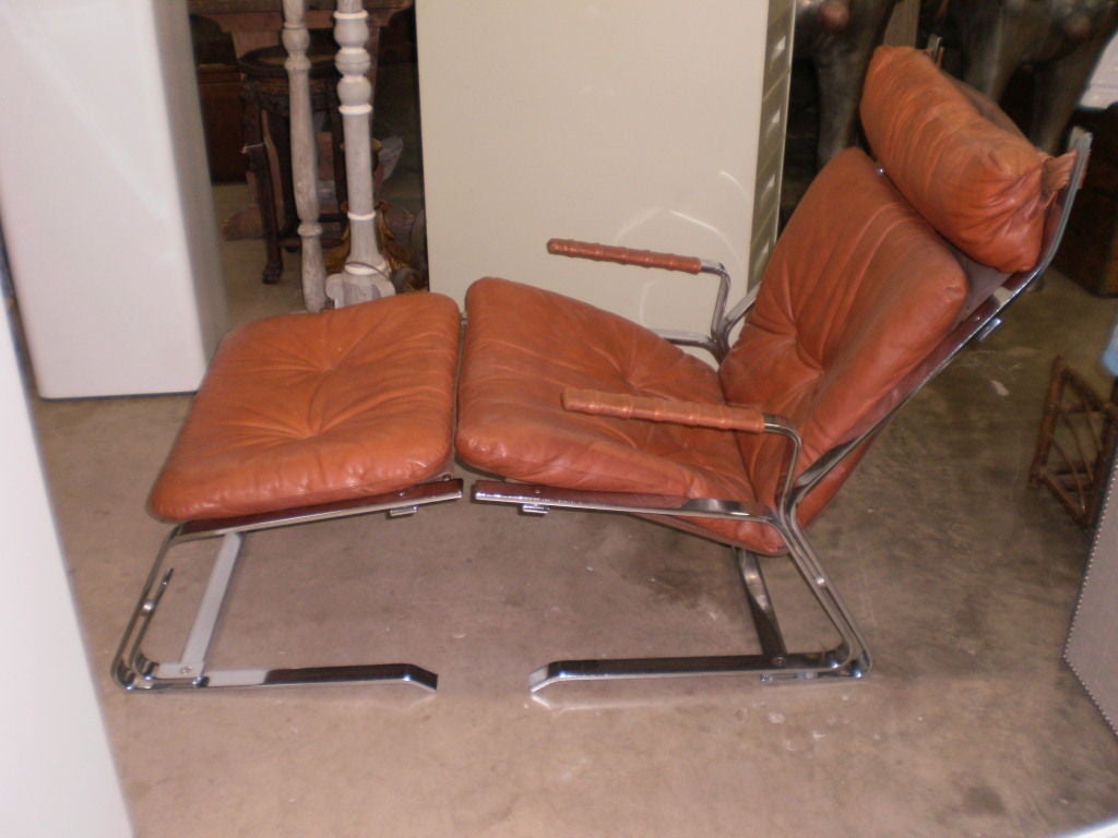 Great Midcentury Italian Design of a Chrome and Leather Lounge Chair and Matching Ottoman by Saporetti.

Please click KIRBY ANTIQUES logo below to view additional pieces from our vast inventory.