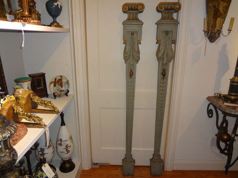Italian Neoclassical style painted and giltwood architectural pilaster columns.
Lovely pair of 19th century Italian Louis XVI style hand carved, painted and gilt wood Neoclassical style architectural pilaster columns with capitals and swags. These