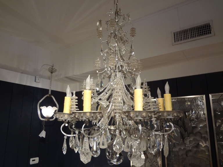 Stunning French Maison Bagues eight-light beaded and crystal chandelier from the 1940's, newly wired for U.S. market. (versatile size for lower ceilings or can be hung from chain).

Please click KIRBY ANTIQUES logo below to view additional pieces