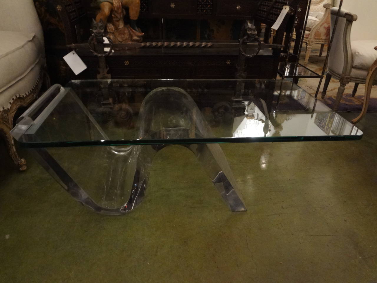 Mid-Century Modern Lucite/acrylic cantilevered coffee table or cocktail table with new glass.

  
