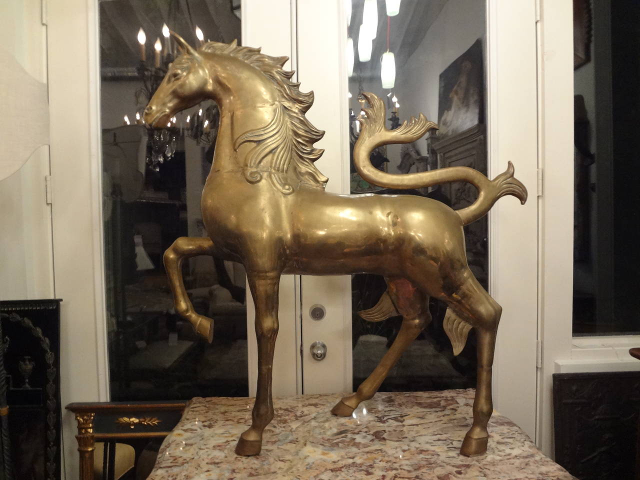 Monumental Mid-Century mythological brass unicorn or horse.

Please click KIRBY ANTIQUES logo below to view additional pieces from our vast inventory.