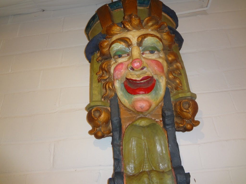 Monumental Hand Decorated Polychromed Terra Cotta Carnival Clown Bust Mounted on Board.