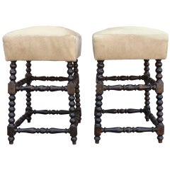 Pair of 1920
s English Mahogany and Cow Hide Bobbin Stools