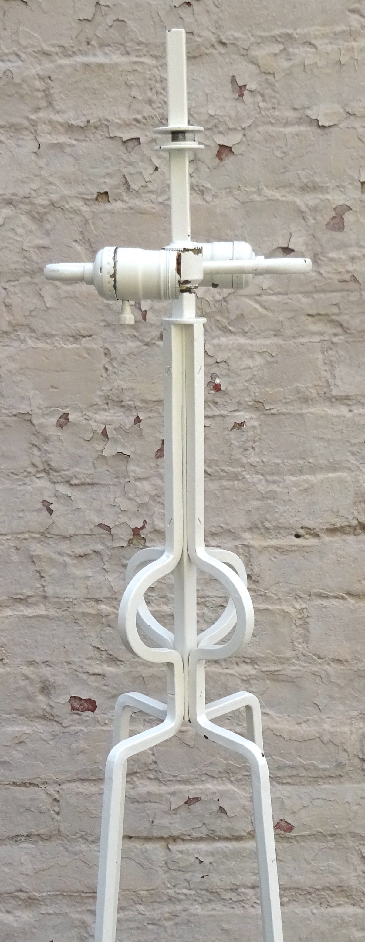 1950s Tommi Parzinger painted wrought iron floor lamp with original shade.