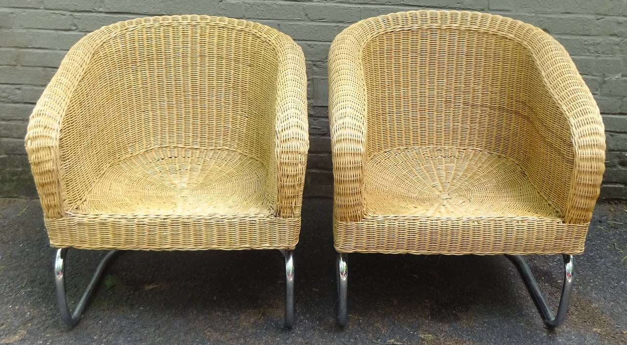 Fabulous pair of 1970s Italian wicker and chrome lounge chairs.