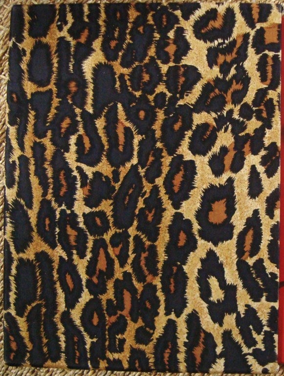 Diana Vreeland: Immoderate Style, by Richard Martin and Harold Koda, The Metropolitan Museum of Modern Art, 1993.  This coveted and scarce coffee table book, with its lipstick red paperback insert and chic leopard printed cloth covered slip case,