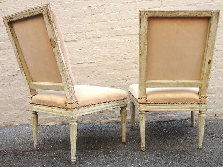 Pair of 18th century French Louis XIV period painted side chairs, purchased by Cole Porter and his wife in the 1920's in Paris, and upholstered by Billy Baldwin in the 1950's.  They retain their original faded peach velvet.  Chairs have an