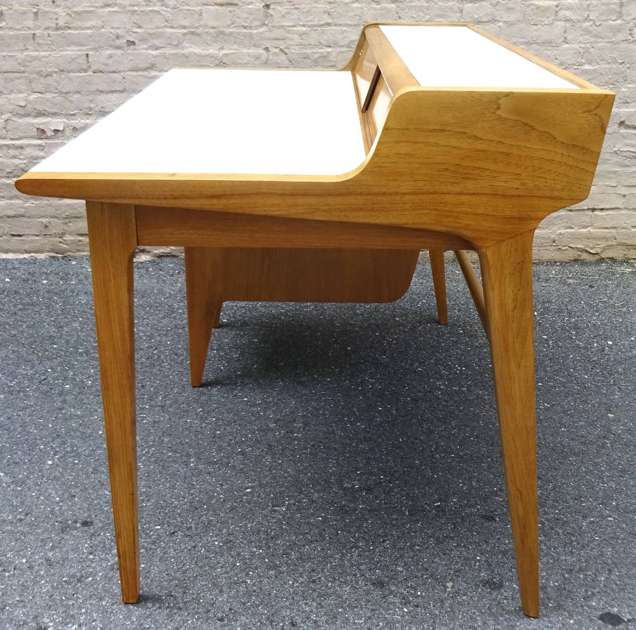 Sculptural 1950s American modernist bleached walnut desk.