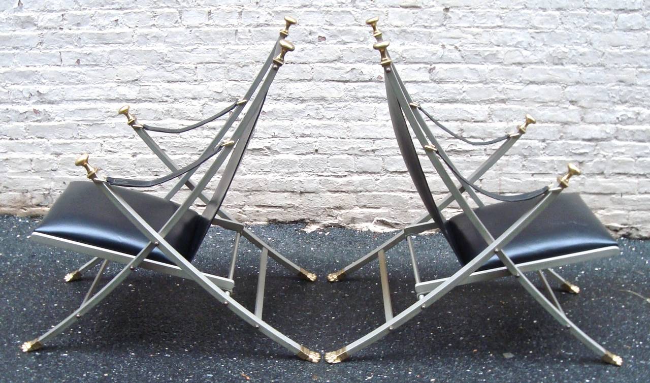 Fabulous pair of 1960s steel and leather lounge chairs, in the style of Maison Jansen.