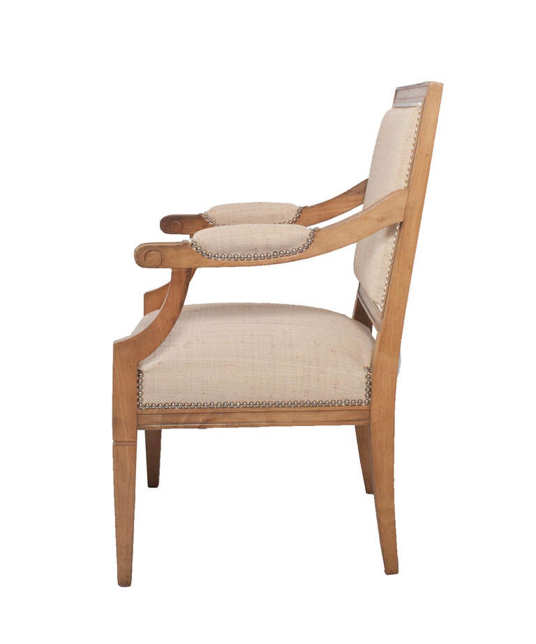 A Pair of Louis XVI Style Square Back Light Walnut Fauteuils with New Raffia Cover.