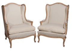 A Pair of Jansen Wing Chair Fauteuils