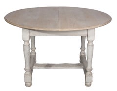 A Painted Dining Table With Two Leaves