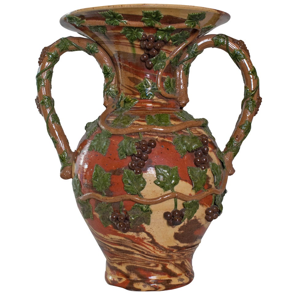 A Large "Uzes" Ceramic Vase with Grape Vine Decoration Body