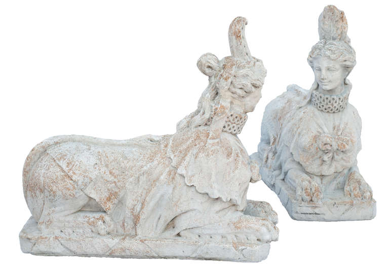 A Pair of Composition Stone Sphinxes with Wonderful Detail.

The base is 15