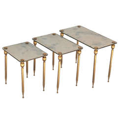 A Set of Three Brass Side Tables with Mirror Tops 12