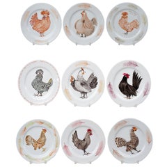 Set of Nine Hand-Painted Limoges Porcelain Plates with Rooster Decoration