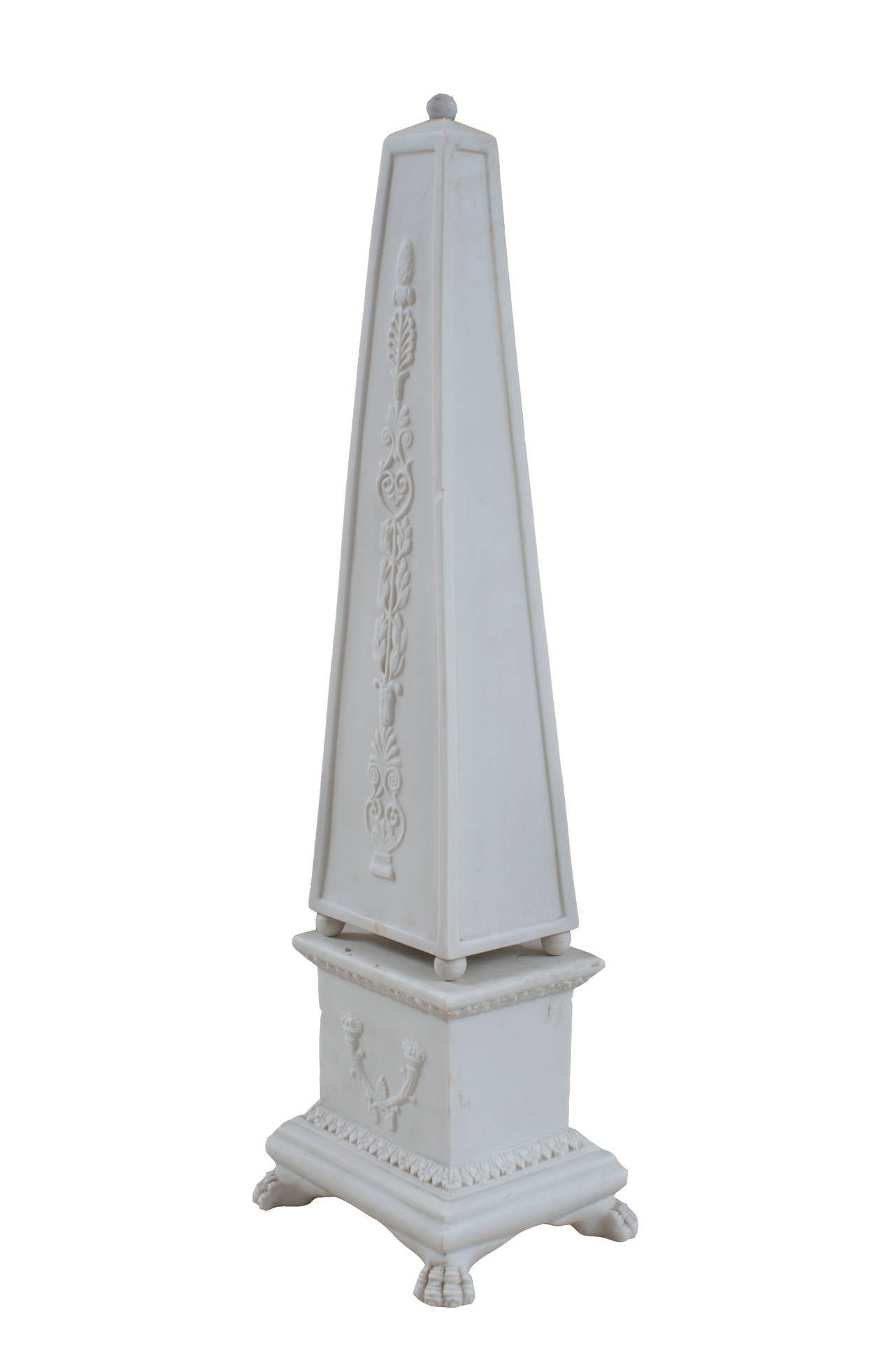 Pair of white porcelain Obelisks with side decorations matte finish.
