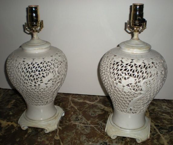 Pair of Japanese white ceramic urn table lamps with cherry blossom tree motif
Measures: W 8