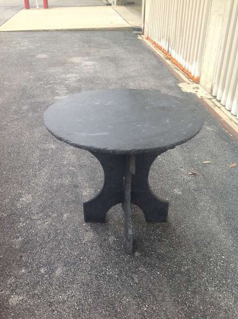 Small French Slate Table.  Could be used inside or outside.

Base is separate from the top.  3 pieces total