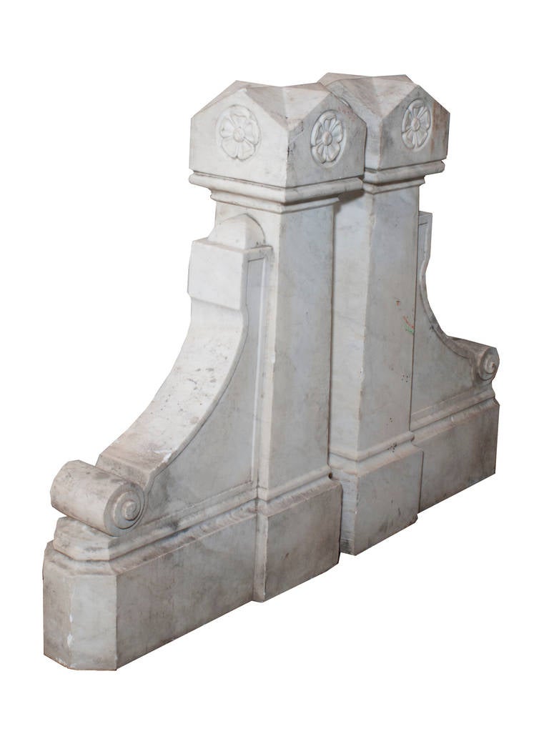 A pair of Architectural Fragments in White Marble.  This pair is from a very old building in Italy.