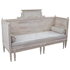 A Gustavian Bench with Beautiful Plaster Caryatid Decoration on the back.