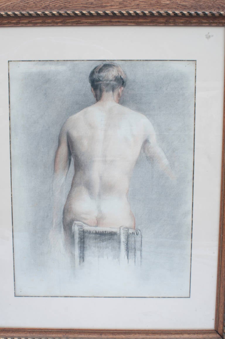 A pair of academic drawings of a man's back.