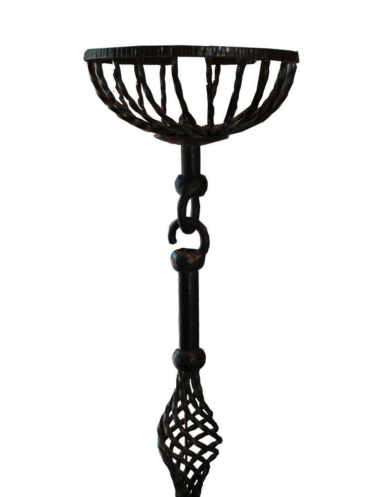 A Six-arm artisanal wrought iron chandelier.