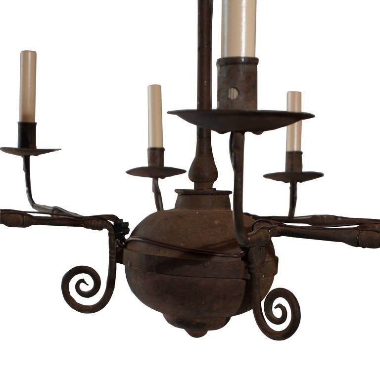 Cast iron nine-arm chandelier.