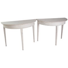 A Pair of Greyish White Painted Gustavian Style Demi Lunes