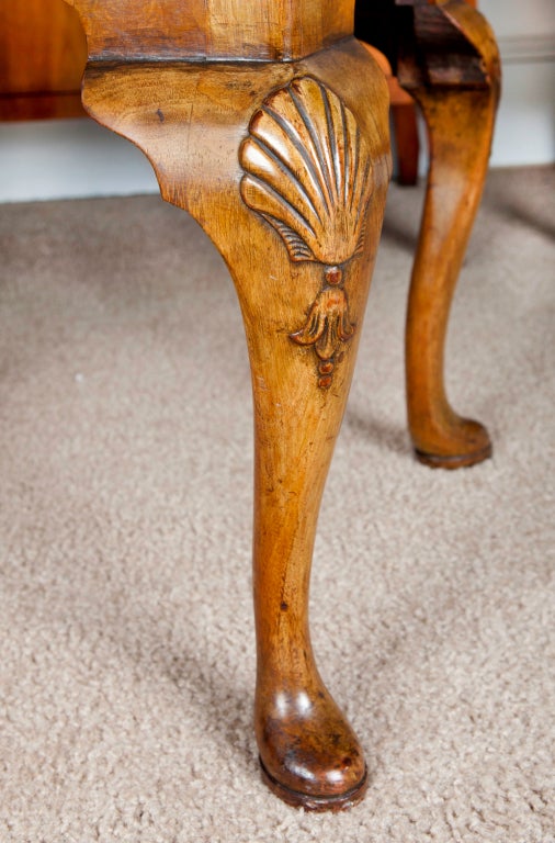 This bench has very well-porportioned hand-carved cabriole legs and an excellent shaped apron. The wood has a rich, mellow glow as well as a beautiful grain.