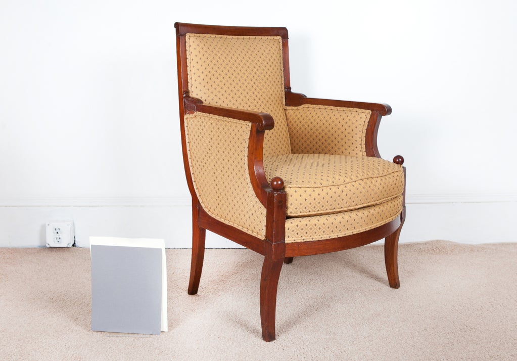 This armchair has a mahogany frame. Recently reupholstered with down wrapped cushion.