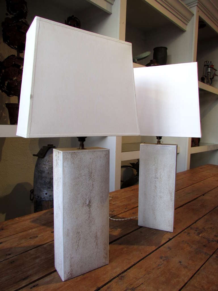 Pair of rectangular lamps covered in white shagreen and bone includes shades