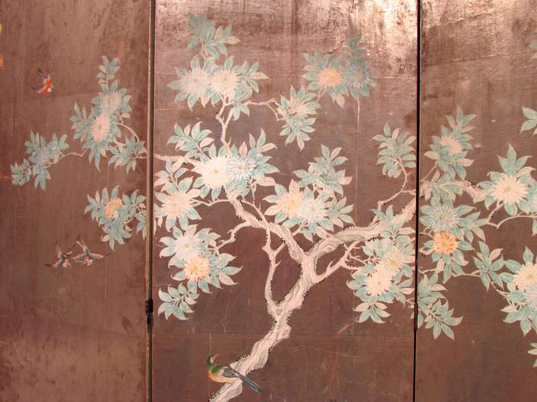 Four panel folding screen with hand painted scene on silver leaf