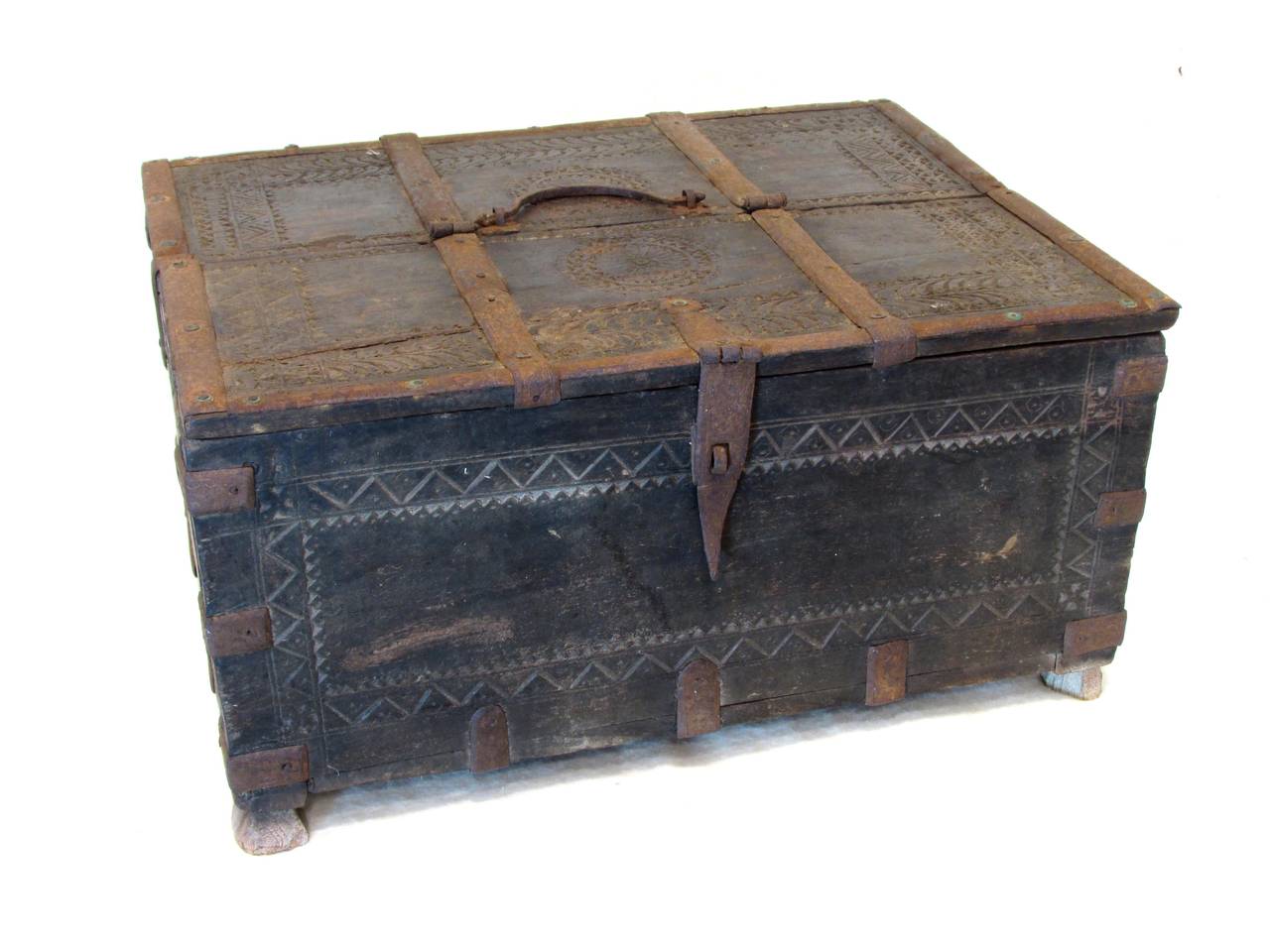 Small worn and weathered carved teak wood box with iron decoration