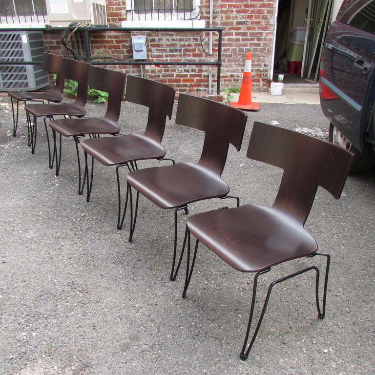 Set of six brown stained Anziano chairs a modern take on classical klismos chair designed by John Hutton for Donghia