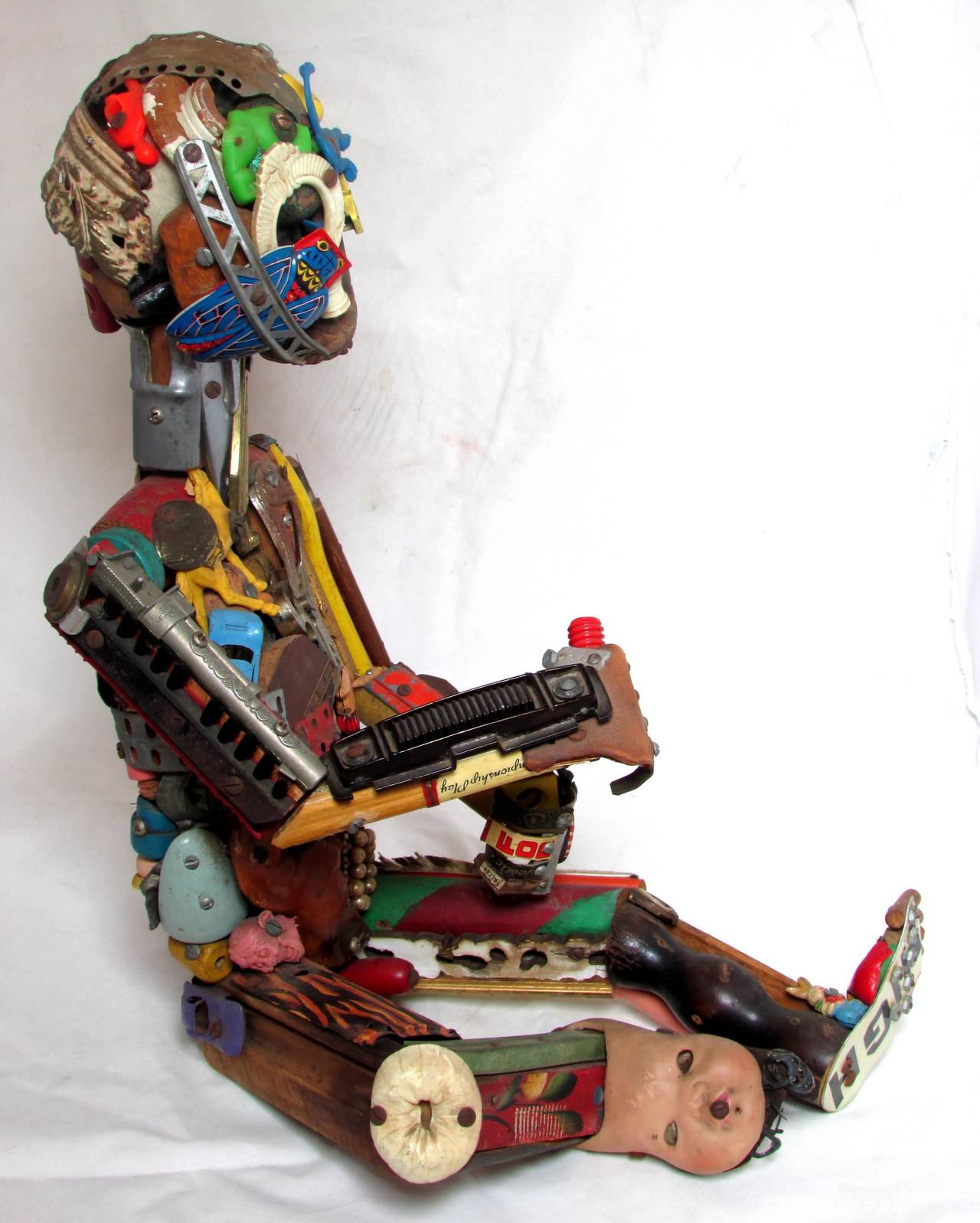 Lifesize sculpture of a baby made with found objects by Philadelphia sculptor Leo Sewell (b 1945)