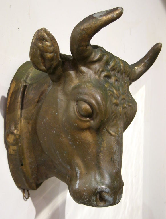 Gilt coated molded tin Bulls head trade sign from French Boucherie