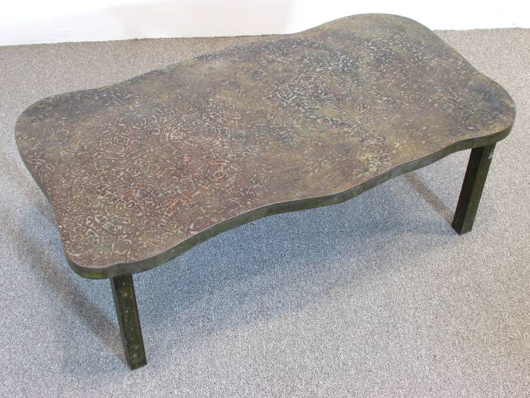 Beautiful spiral etched bronze coffee table by Philip and Kelvin LaVerne.