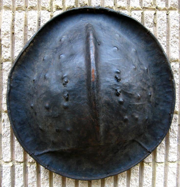 Large round textured shield made from the hide of hippopotamus from the Gurage / Zay tribes of Southern Ethiopia