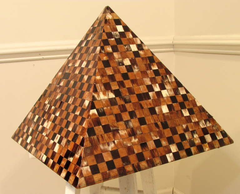 Pyramid covered with small lacquered pieces of horn