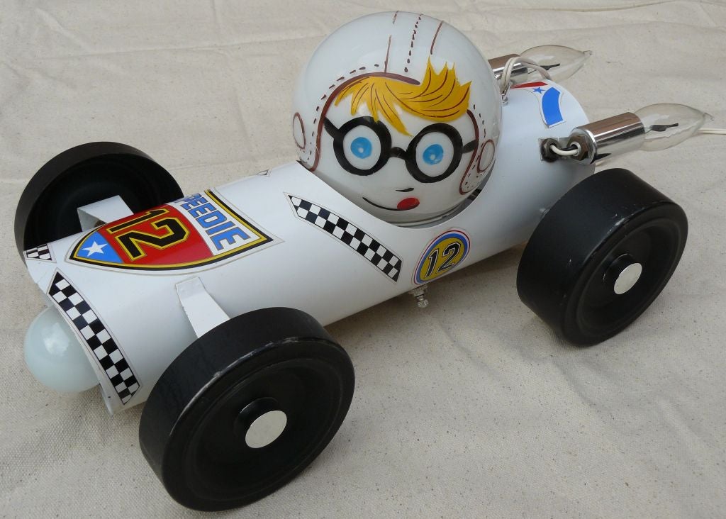 60s Speedie Race Car Lamp<br />
<br />
Hand painted milk glass globe, enameled all metal construction with applied stickers. Three way switch & an extra long cord. Excellent condition,