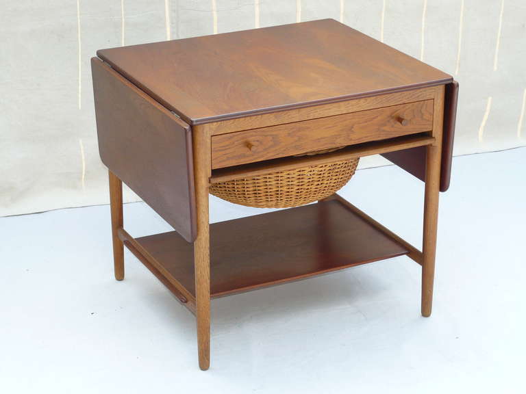 Hans J. Wegner for Andreas Tuck Sewing Table. Great old example, nice contrast between the oak & dark teak.